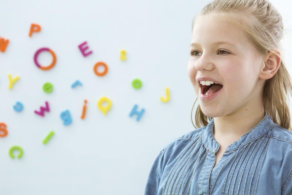 A Little Girl Opening Her Mouth - Speech Therapy